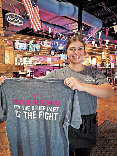 Ford’s Garage selling Pink Fund T-shirts during Breast Cancer Awareness Month